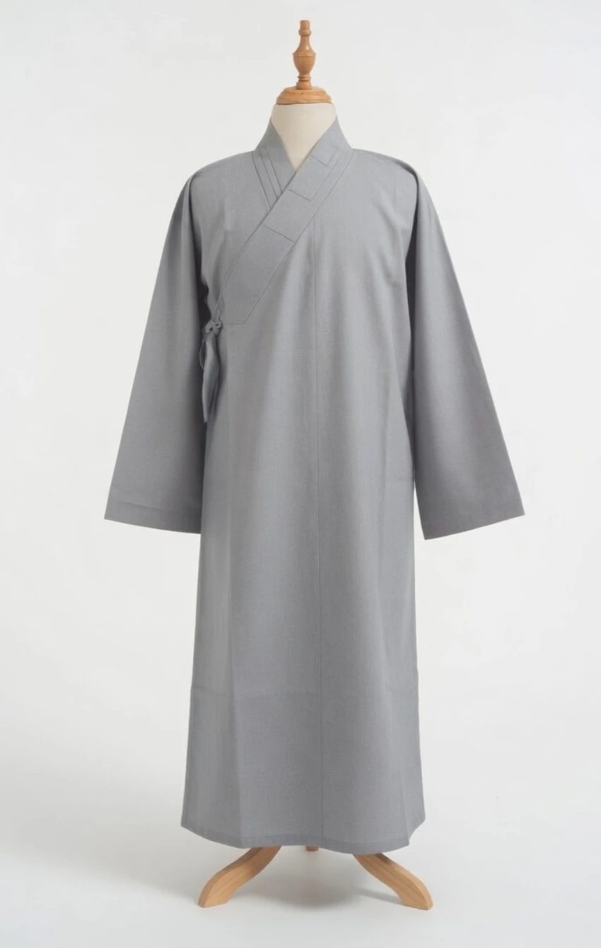 Long grey wrap robe on a dress form, with a crossed front and waist tie.